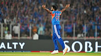 (AP Photo/Ajit Solanki) : India's Jasprit Bumrah celebrates the wicket of South Africa's Quinton de Kock during the T20 World Cup cricket match between India and South Africa in Ahmedabad, India, Sunday, Feb. 22, 2026