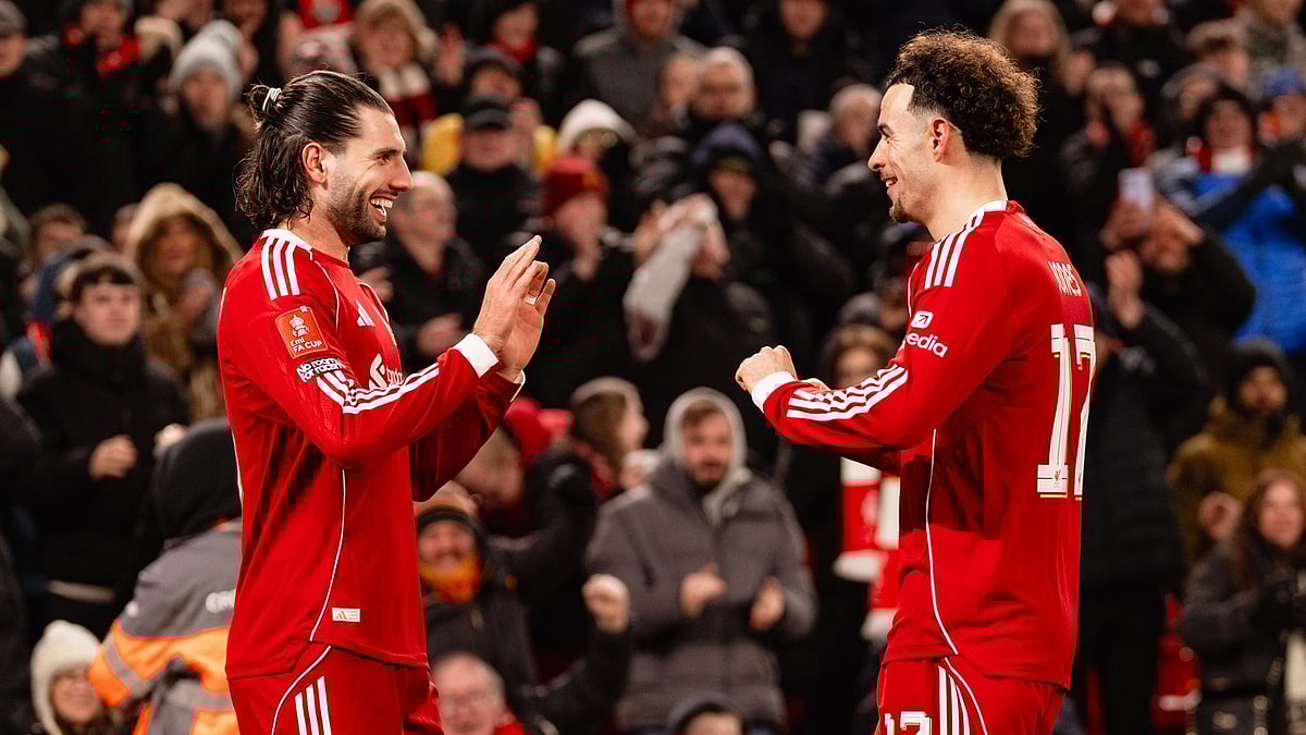 Liverpool footballers celebrating a goal against Brighton in FA Cup 2025-26.  - LFC/X