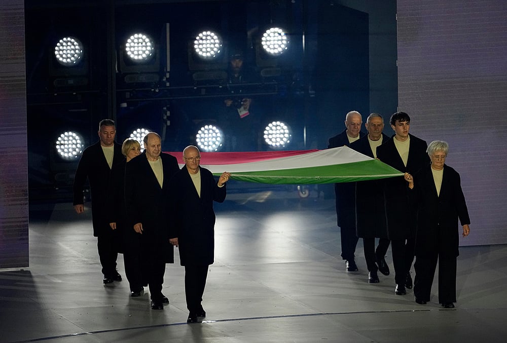 Milan Cortina Winter Olympics Closing Ceremony-Flagbearers carry