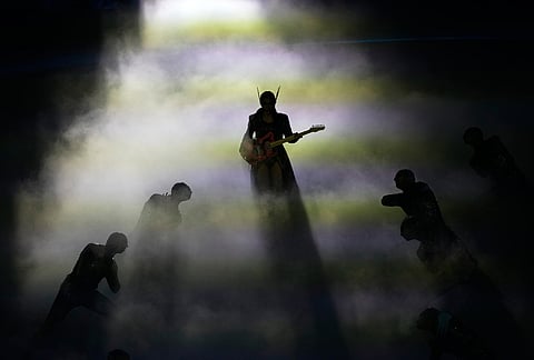 Artists perform during the closing ceremony of the 2026 Winter Olympics, in Verona, Italy.