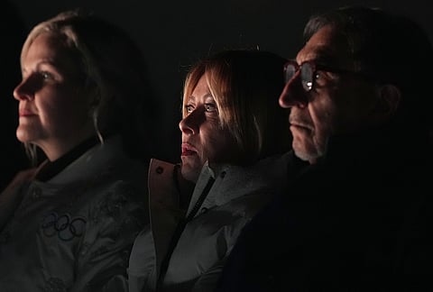 Italy's Prime Minister Giorgia Meloni, center, attends the closing ceremony of the 2026 Winter Olympics, in Verona, Italy.