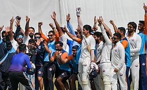 PTI : Jammu and Kashmir's Vanshaj Sharma with teammates , seen celebrating after the team's victory in the Ranji Trophy semifinal cricket match against Bengal, at the Bengal Cricket Academy Ground, in Kalyani, West Bengal, Wednesday, Feb. 18, 2026.