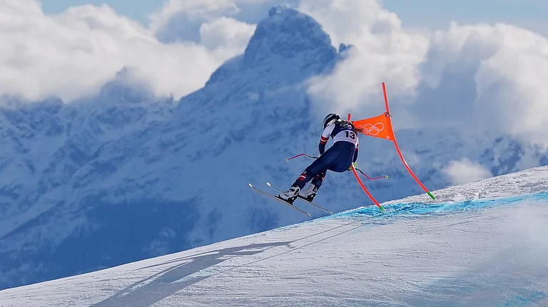 United States' Lindsey Vonn crashes into a gate during an alpine ski women's downhill race, at the 2026 Winter Olympics, in Cortina d'Ampezzo, Italy, Feb. 8, 2026. - | Photo: AP/Jacquelyn Martin