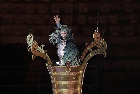 An artist performs during the closing ceremony of the 2026 Winter Olympics, in Verona, Italy.