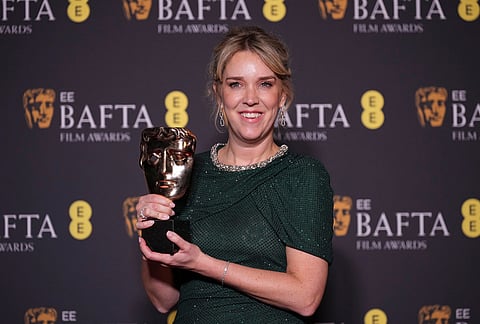 Lauren Evans poses with the award for casting for 'I Swear' at the 79th British Academy Film Awards, BAFTA's, in London.