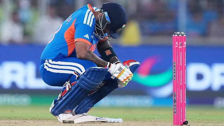 India's captain Suryakumar Yadav takes a breather after getting hit by a delivery from South Africa's Lungi Ngidi during the T20 World Cup cricket match between India and South Africa in Ahmedabad, India, Sunday, Feb. 22, 2026. - | Photo: AP/Ajit Solanki