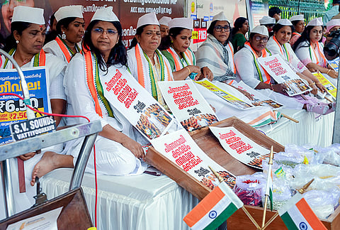 Mahila Congress activists stage a protest against alleged price rise and anti-women policies of the Kerala government, in Thiruvananthapuram.