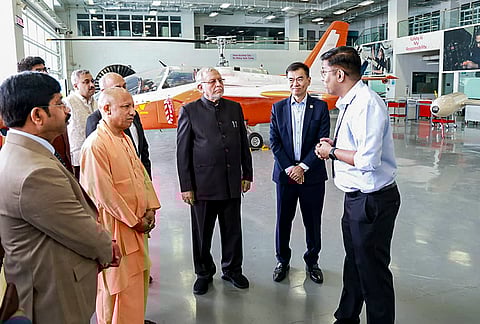 Uttar Pradesh Chief Minister Yogi Adityanath, second left, during a visit to the Institute of Technical Education (ITE) Headquarters and ITE College Central, in Singapore. 