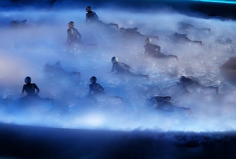 Artists perform during the closing ceremony of the 2026 Winter Olympics, in Verona, Italy.
