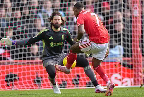 Nottingham Forest's Callum Hudson-Odoi shoots on goal during the English Premier League soccer match between Nottingham Forest and Liverpool in Nottingham.
