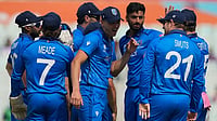 File/AP : Italy players celebrate the wicket of West Indies' Brandon King during a T20 World Cup match in Kolkata.