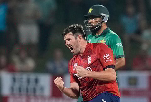 England's Jamie Overton celebrates the wicket of Pakistan's Sahibzada Farhan during the T20 World Cup cricket match between England and Pakistan in Pallekele, Sri Lanka.