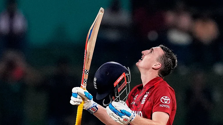 England's captain Harry Brook celebrates his century during the T20 World Cup cricket match between England and Pakistan in Pallekele, Sri Lanka, Tuesday, Feb. 24, 2026. - (AP Photo/Eranga Jayawardena)