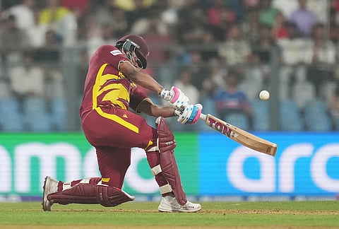 West Indies' Shimron Hetmyer plays a shot during the T20 World Cup cricket match between Zimbabwe and West Indies in Mumbai.