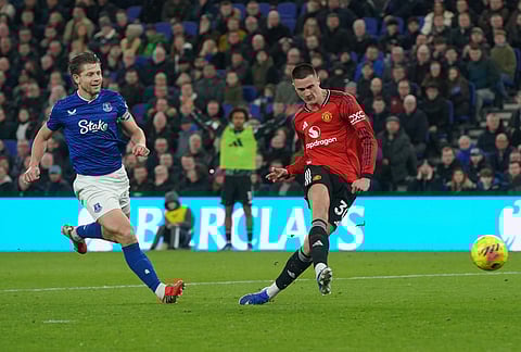 Manchester United's Benjamin Sesko cscores during the Premier League soccer match between Manchester United and Everton in Liverpool, England.