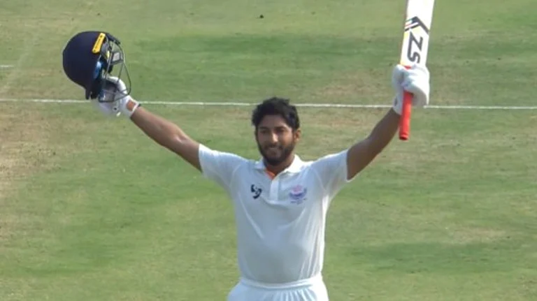 Shubham Pundir celebrating after scoring a century during Karnataka vs Jammu and Kashmir Ranji Trophy 2025-26 final at Hubbali. - BCCIdomestic/X