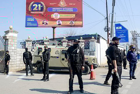 Special Operations Group (SOG) personnel of Jammu and Kashmir Police stand guard at the University of Kashmir amid heightened security ahead of Vice President CP Radhakrishnan's visit, in Srinagar.
