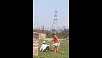 Uttarakhand: Muslim Man Beaten For Offering Namaz Near Temple In Rudrapur video screen grab from X : Shahid stated that he had been working near the temple for several days and insisted the land where he offered namaz was quite far from the temple itself.