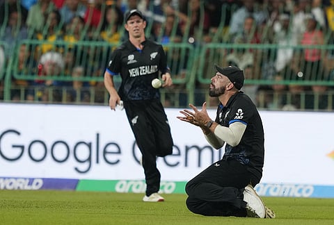 New Zealand's Daryl Mitchell takes the catch to get Sri Lanka's Dushan Hemantha during the T20 World Cup cricket match between Sri Lanka and New Zealand in Colombo, Sri Lanka.