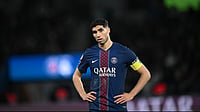 | Photo: AP/EMMA DA SILVA : PSG's Achraf Hakimi reacts during the French League 1 match between Paris Saint-Germain and Metz in Paris, France, Saturday, Feb. 21, 2026. 