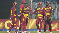 | Photo: AP/Rafiq Maqbool : West Indies players celebrates after their win against Zimbabwe during the T20 World Cup cricket match in Mumbai, India, Monday, Feb. 23, 2026. 