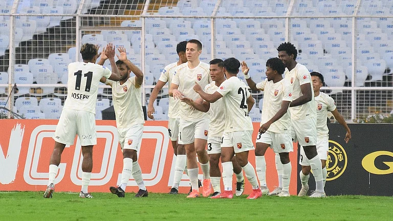 SC Delhi players celebrates after Augustine Lalrochana's goal against East Bengal during their Indian Super League match on February 21, 2026. - | Photo: AIFF