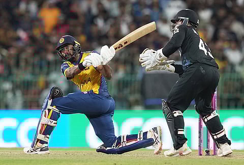 Sri Lanka's Kamindu Mendis plays a shot during the T20 World Cup cricket match between Sri Lanka and New Zealand in Colombo, Sri Lanka.