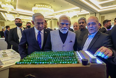 Prime Minister Narendra Modi with Israeli Prime Minister Benjamin Netanyahu during a visit to a technology exhibition, in Jerusalem, Israel. 