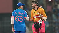 (AP Photo/Mahesh Kumar A.) : India's captain Suryakumar Yadav, left, shake hands with Zimbabwe's Brian Bennett after winning the T20 World Cup cricket match between India and Zimbabwe in Chennai, India, Thursday, Feb. 26, 2026