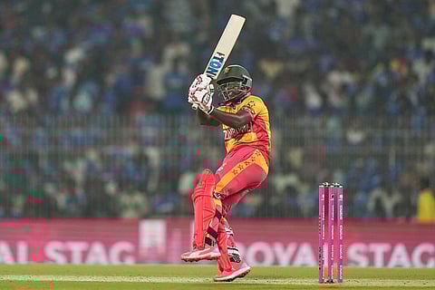 Zimbabwe's Tony Munyonga plays a shot during the T20 World Cup cricket match between India and Zimbabwe in Chennai, India.