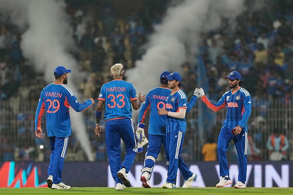 Indian players celebrate after winning the T20 World Cup cricket match between India and Zimbabwe in Chennai, India. - | Photo: AP/Mahesh Kumar A.