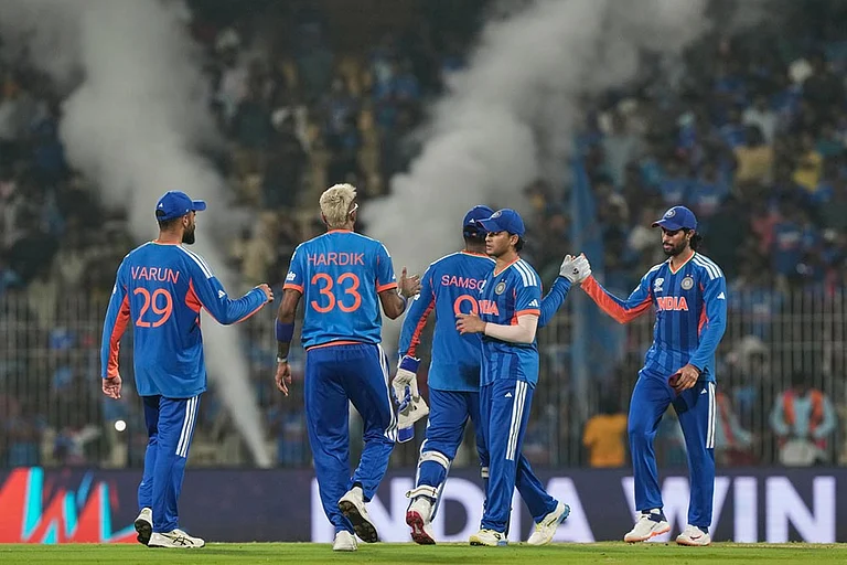 Indian players celebrate after winning the T20 World Cup cricket match between India and Zimbabwe in Chennai, India. - | Photo: AP/Mahesh Kumar A.