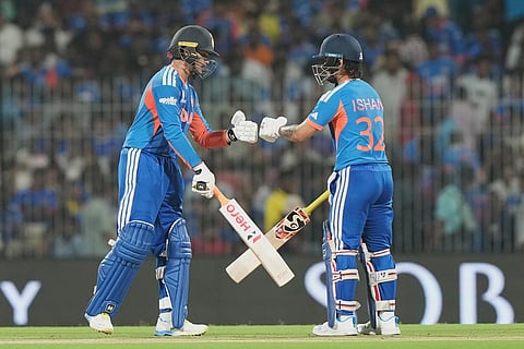 India's Abhishek Sharma, left fist bumps his batting partner Ishan Kishan during the T20 World Cup cricket match between India and Zimbabwe in Chennai, India.