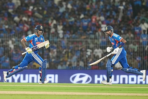 India's captain Suryakumar Yadav, left, and Hardik Pandya run between the wickets during the T20 World Cup cricket match between India and Zimbabwe in Chennai, India.