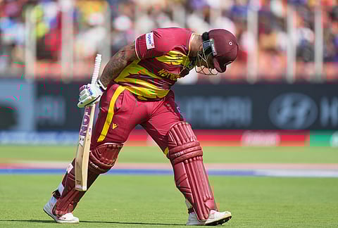 West Indies' Shimron Hetmyer reacts as he leaves the ground after losing his wicket during the T20 World Cup cricket match between South Africa and West Indies in Ahmedabad.