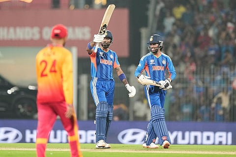 India's Hardik Pandya, center, celebrates his fifty runs along with his batting partner Tilak Varma, right, during the T20 World Cup cricket match between India and Zimbabwe in Chennai, India.