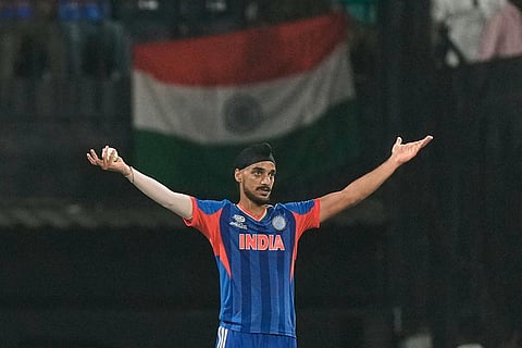 India's Arshdeep Singh celebrates the wicket of Zimbabwe's Ryan Burl during the T20 World Cup cricket match between India and Zimbabwe in Chennai, India.