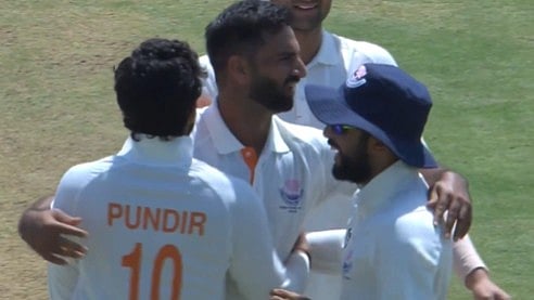 Auqib Nabi celebrating with Jammu and Kashmir teammates after dismissing KL Rahul, Karun Nair and Smaran Ravichandran in Ranji Trophy 2025-26 final.  - BCCIdomestic/X