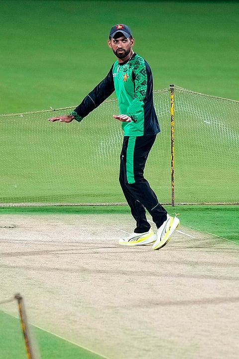 Zimbabwe's captain Sikandar Raza inspects the pitch during a training session ahead of the ICC Men's T20 World Cup 2026 cricket match between India and Zimbabwe, at MA Chidambaram Stadium, in Chennai.