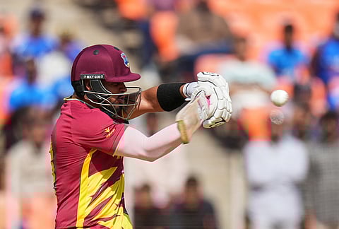 West Indies' Brandon King bats during the T20 World Cup cricket match between South Africa and West Indies in Ahmedabad.