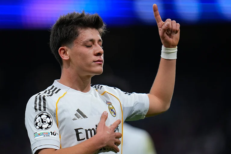 Real Madrid's Arda Guler celebrates after scores a disallowed goal during the second leg of the Champions League playoff soccer match between Real Madrid and Benfica in Madrid, Spain, Wednesday, Feb. 25, 2026. - | Photo: AP/Manu Fernandez
