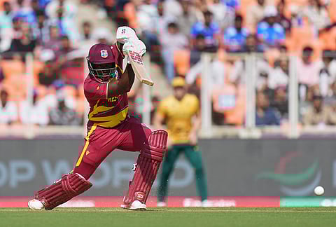 West Indies' Rovman Powell plays a shot during the T20 World Cup cricket match between South Africa and West Indies in Ahmedabad.