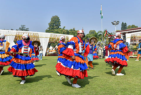 Artists perform 'Choliya' dance on the first day of the three-day flower show 'Basant Utsav', at Lok Bhavan, in Dehradun.