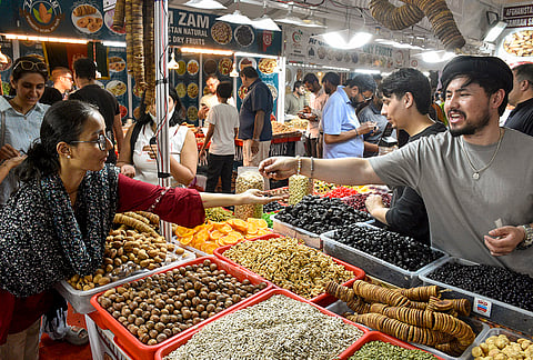 People visit the India International Mega Trade Fair, in Surat.