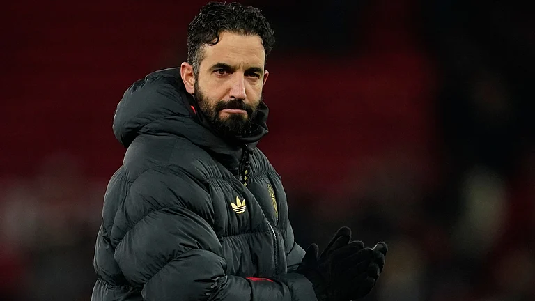 Manchester United's head coach Ruben Amorim walks on the pitch after the English Premier League soccer match between Manchester United and Wolverhampton Wanderers in Manchester, England, Tuesday, Dec. 30, 2025. - | Photo: AP/Dave Thompson