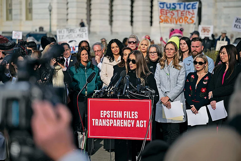 Demanding Justice: Survivor Haley Robson speaks alongside lawmakers during a news conference on the Epstein Files Transparency Act in Washington DC on November 18, 2025 - null