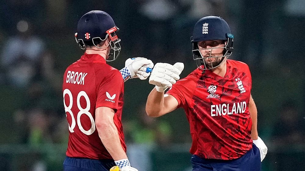 England's captain Harry Brook, left, and Will Jacks celebrate during the T20 World Cup cricket match between England and Pakistan in Pallekele, Sri Lanka. - | Photo: AP/Eranga Jayawardena