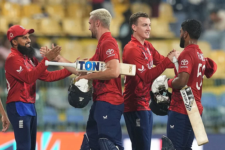 England's captain Harry Brook, second from right celebrates with teammates after their win against New Zealand during the T20 World Cup cricket match in Colombo, Sri Lanka. - | Photo: AP/Eranga Jayawardena