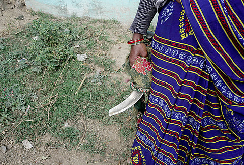 A woman member of Shekhpur guda