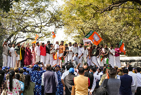 Security personnel keep vigil during a protest by members of Bhartiya Janata Yuva Morcha's (BJYM) Kerala wing, demanding a CBI investigation into the Sabarimala gold loss case, in New Delhi.